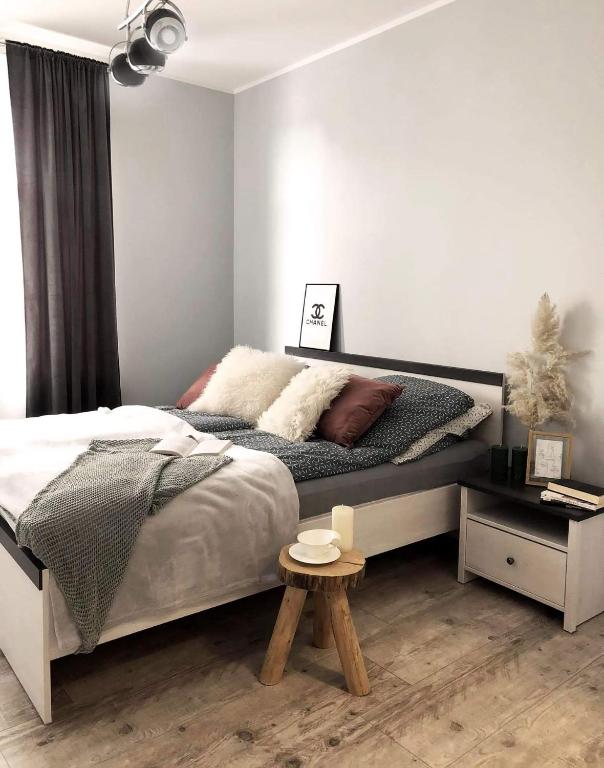 Posteľ alebo postele v izbe v ubytovaní Apartament Stare Miasto