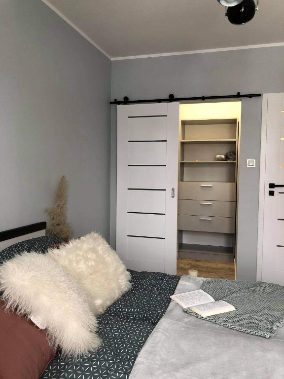 Posteľ alebo postele v izbe v ubytovaní Apartament Stare Miasto