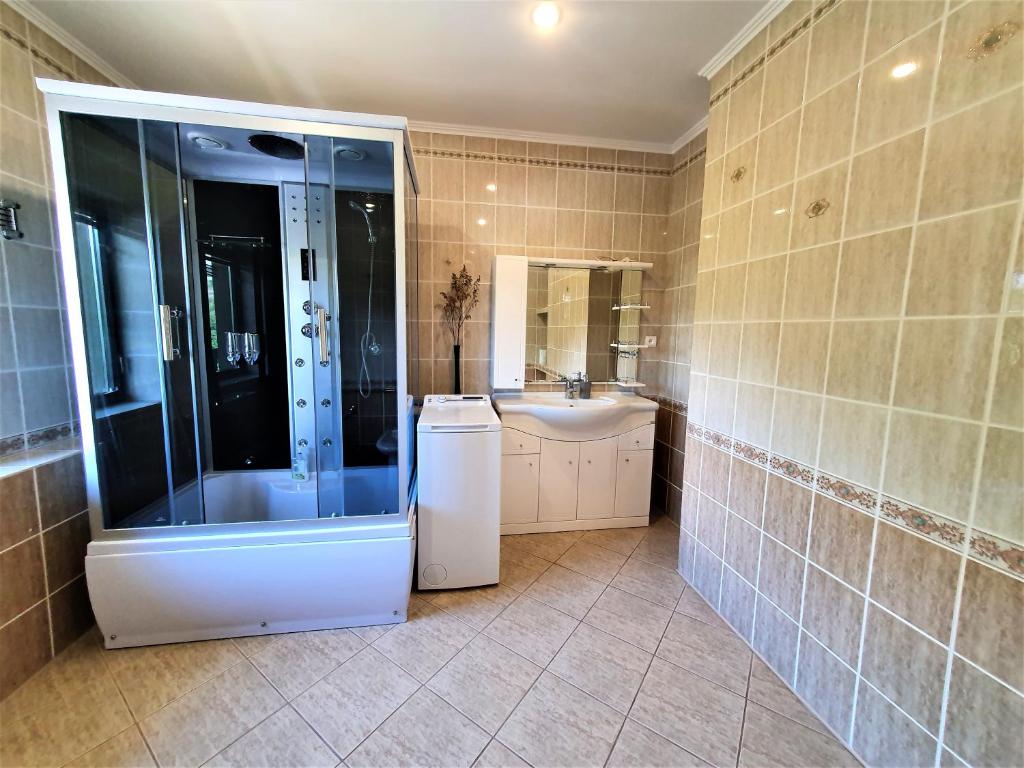 Kúpeľňa v ubytovaní Apartamenty pod Holicą