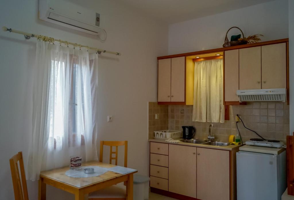 Kuchyň nebo kuchyňský kout v ubytování Coral Apartments