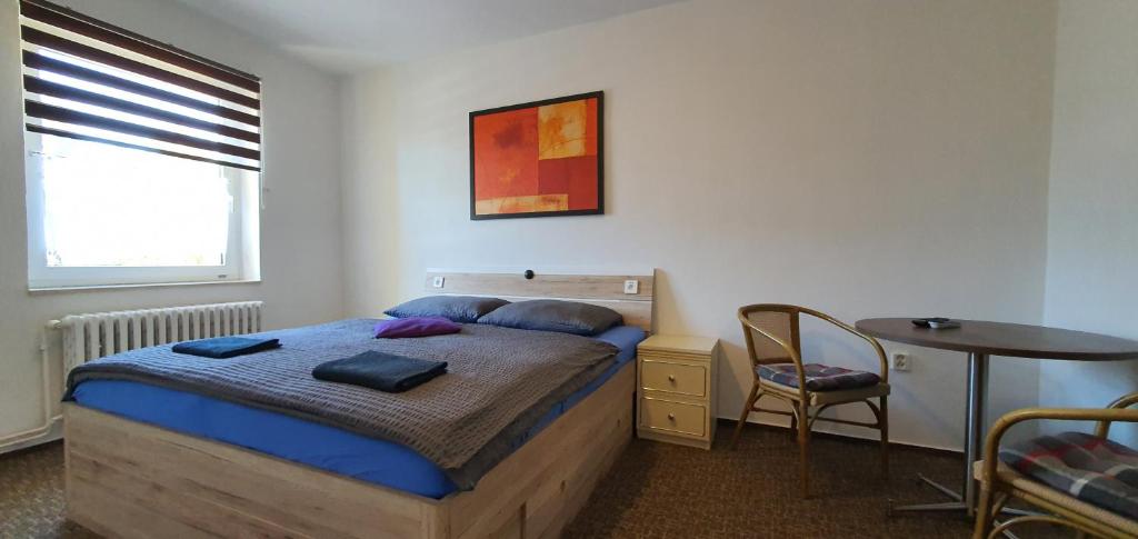 Postel nebo postele na pokoji v ubytování M-Tourist