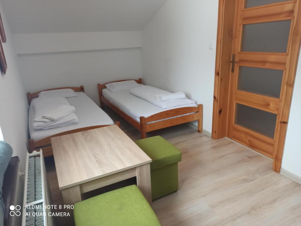 Postel nebo postele na pokoji v ubytování Penzion Réva