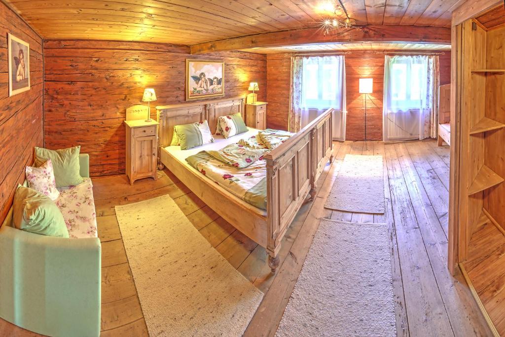 Postel nebo postele na pokoji v ubytování Chalet Rastenhof - Urlaub auf dem Bauernhof in Österreich
