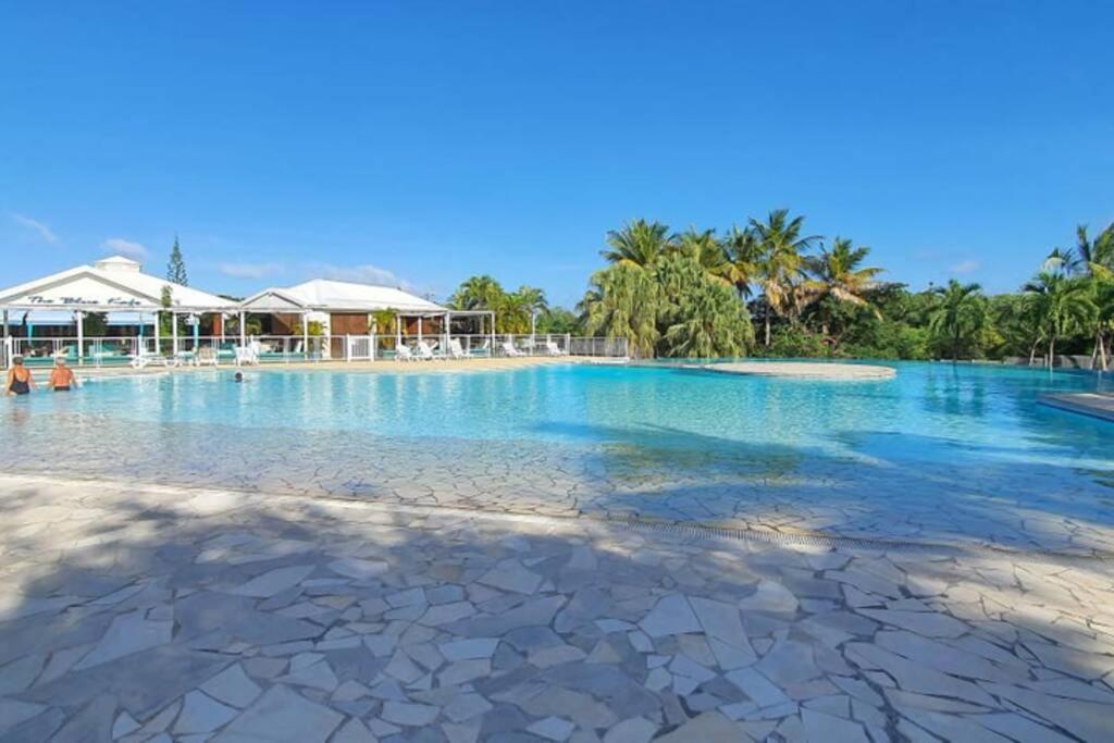 Bazén v ubytování Grand studio Tropical idéalement situé, jardin et piscine nebo v jeho okolí