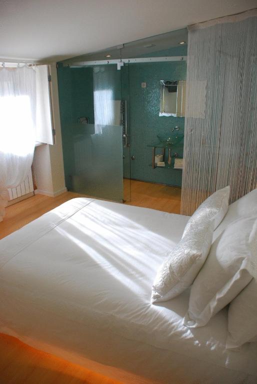 Postel nebo postele na pokoji v ubytování Casa da Cisterna