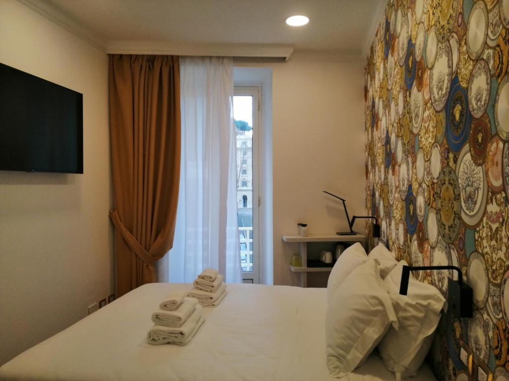 TV a/nebo společenská místnost v ubytování Hotel Cinquantatre