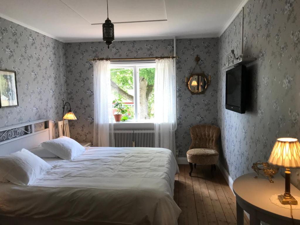 Katil atau katil-katil dalam bilik di Kroksta Gård