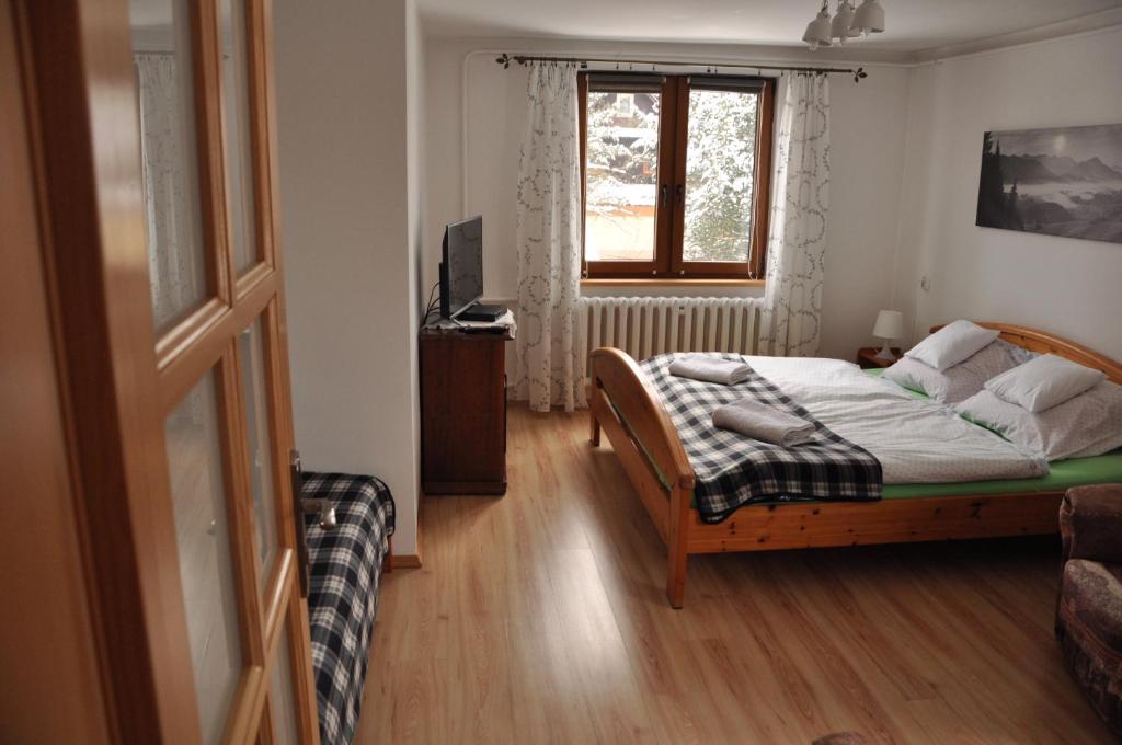 Posteľ alebo postele v izbe v ubytovaní Pod limbą