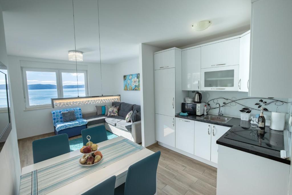 Kuchyň nebo kuchyňský kout v ubytování Apartman Nimfa Živogošće