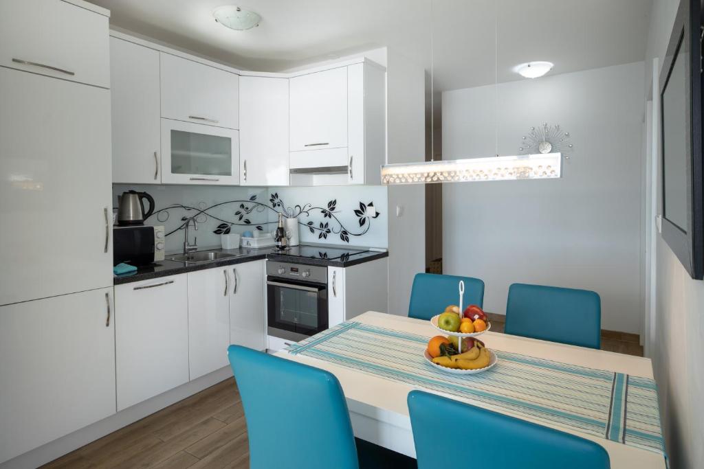 Kuchyň nebo kuchyňský kout v ubytování Apartman Nimfa Živogošće
