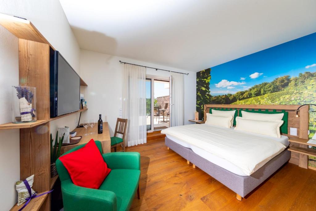 TV a/nebo společenská místnost v ubytování Weingut und Gästezimmer Perner