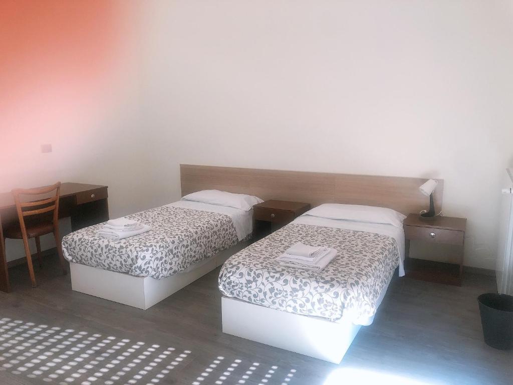 Postel nebo postele na pokoji v ubytování NEW FAMILY INN