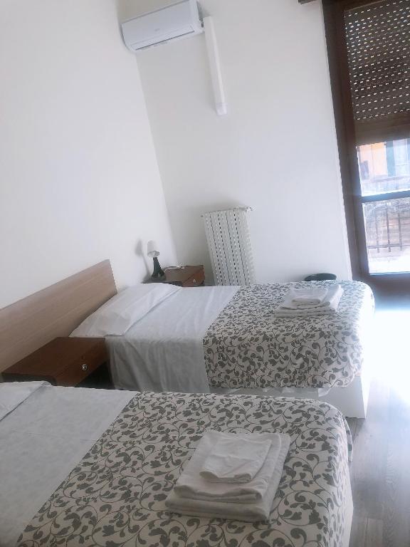 Postel nebo postele na pokoji v ubytování NEW FAMILY INN