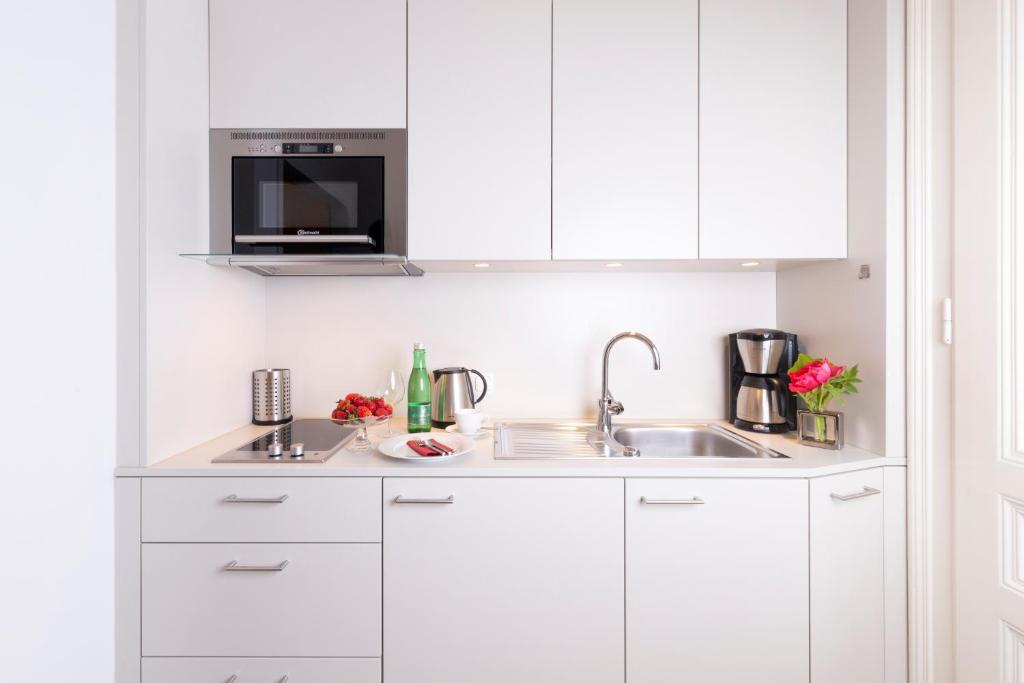 Kuchyň nebo kuchyňský kout v ubytování Pension Seehof Appartements