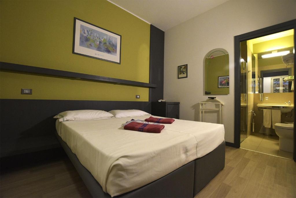 Postel nebo postele na pokoji v ubytování Hotel Imperiale & SPA