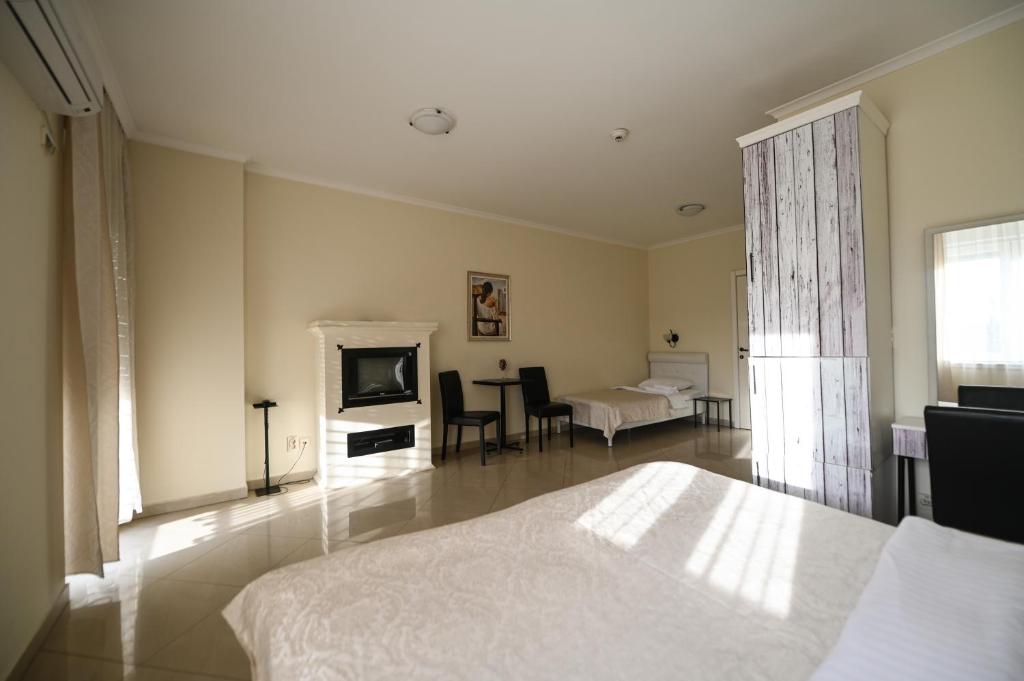 Letto o letti in una camera di Garni Hotel Dash