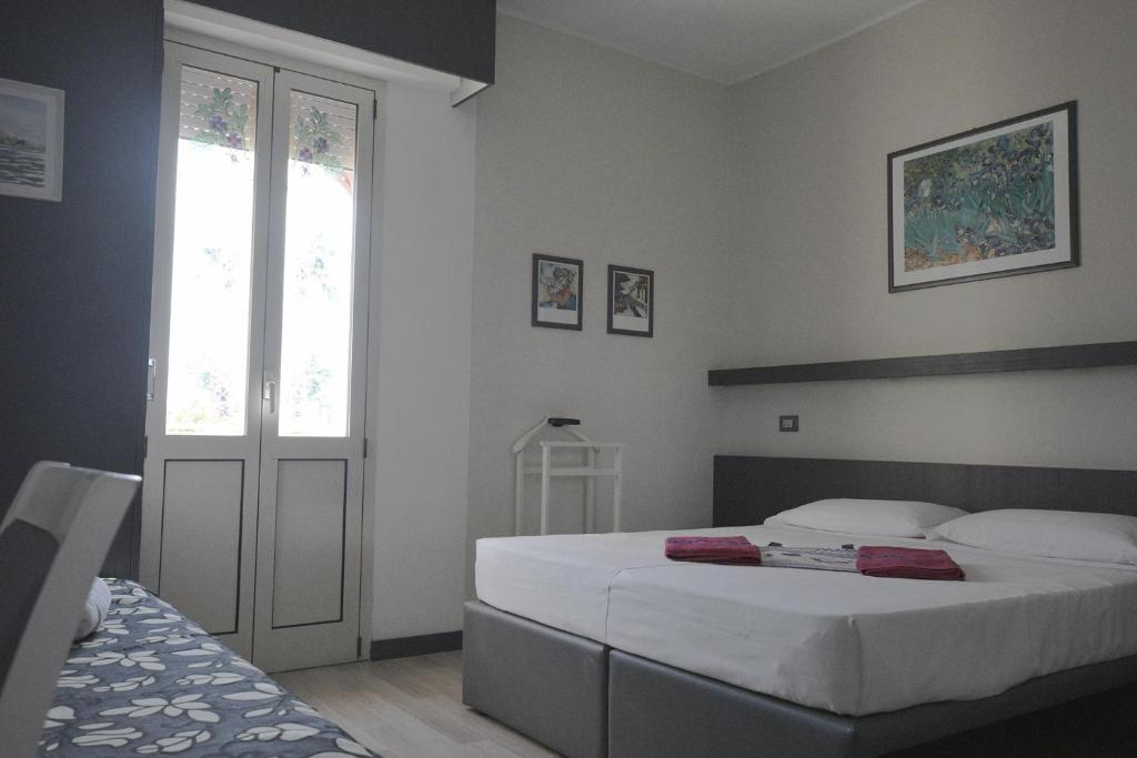 Postel nebo postele na pokoji v ubytování Hotel Imperiale & SPA