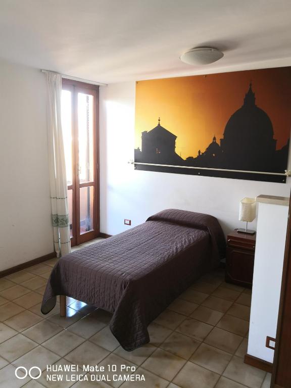 Llit o llits en una habitació de Domus Getsemani