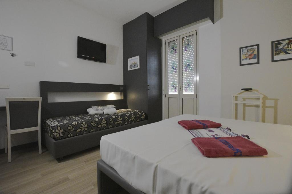 Postel nebo postele na pokoji v ubytování Hotel Imperiale & SPA