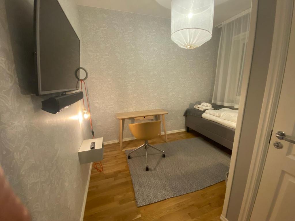 Postel nebo postele na pokoji v ubytování Turinge Hotel