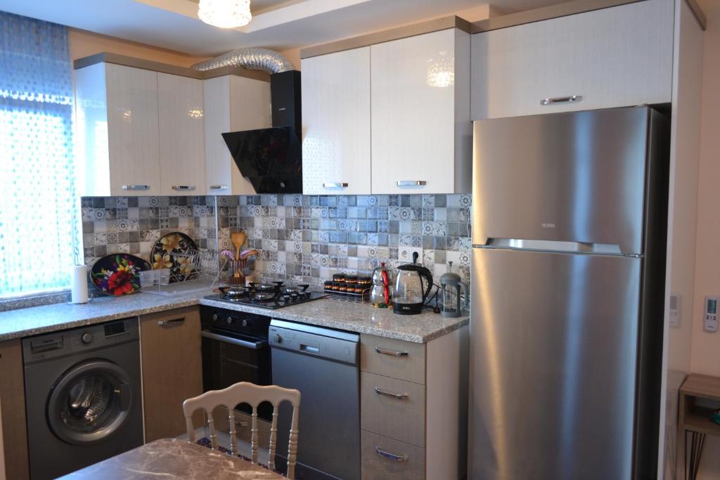 Kuchyň nebo kuchyňský kout v ubytování Family Apart-Hotel "2022"- 3