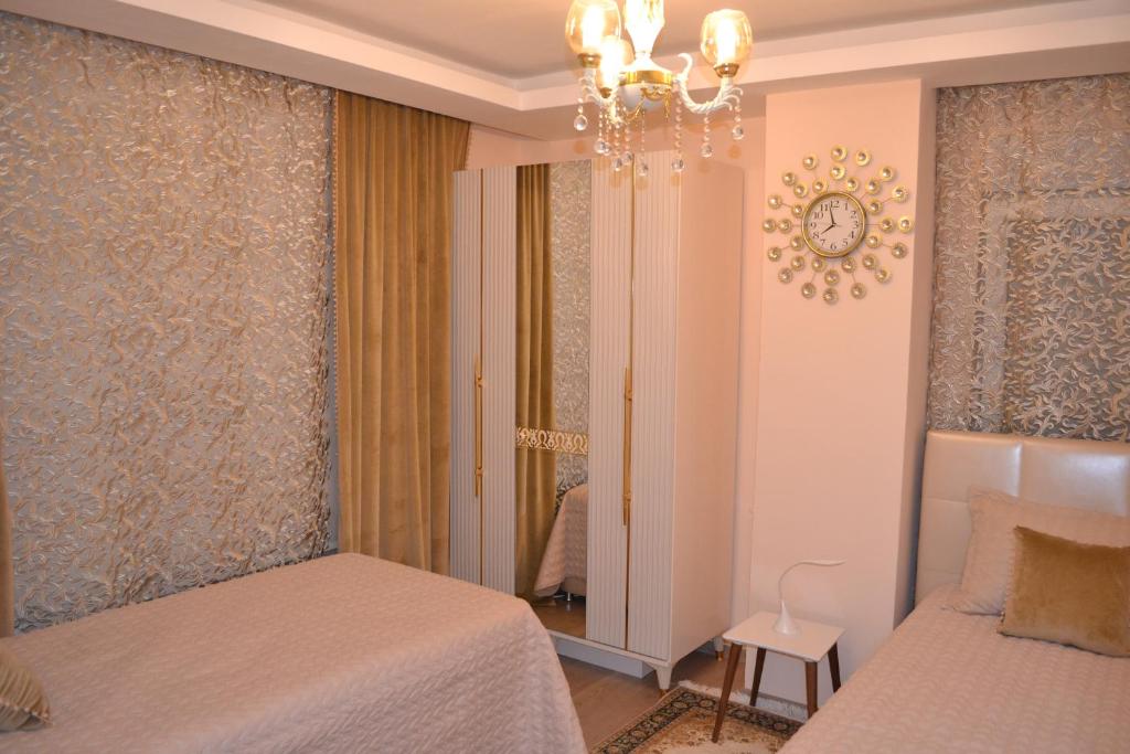 Postel nebo postele na pokoji v ubytování Family Apart-Hotel "2022"- 3