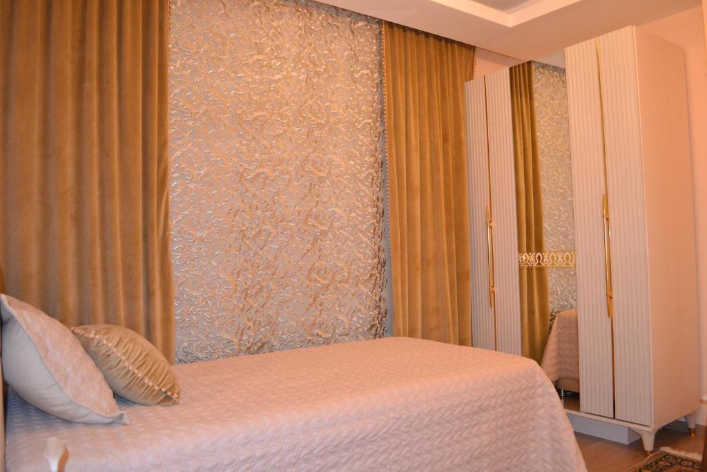 Postel nebo postele na pokoji v ubytování Family Apart-Hotel "2022"- 3
