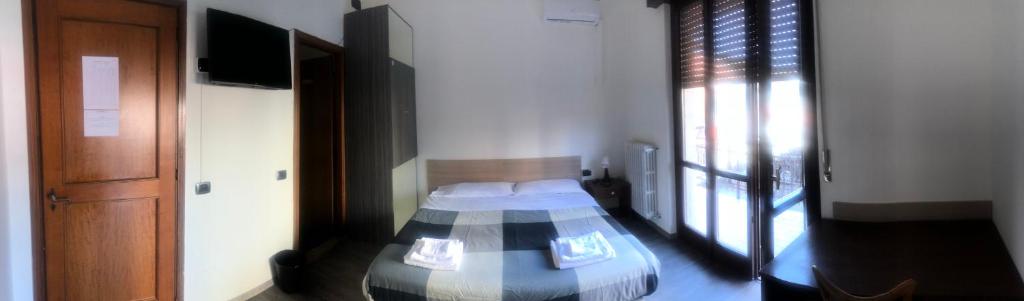Postel nebo postele na pokoji v ubytování NEW FAMILY INN