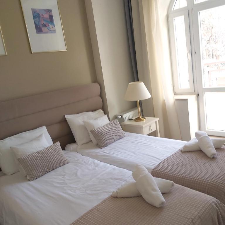 Postel nebo postele na pokoji v ubytování Villa Lessing