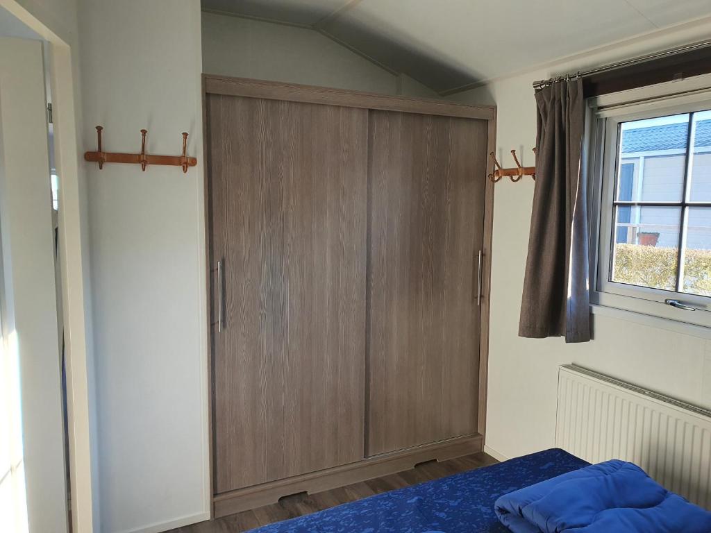 Postel nebo postele na pokoji v ubytování Chalet 11 - Bergzicht Teuven