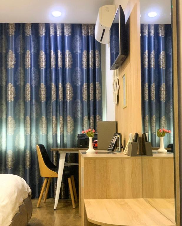 TV a/nebo společenská místnost v ubytování Park Hotel Tirana