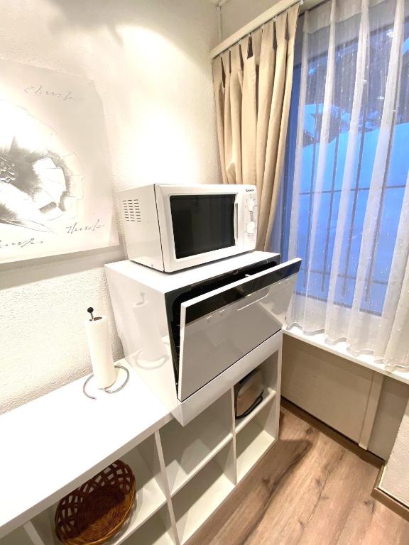 TV a/nebo společenská místnost v ubytování Haus Trynsch Flumserberg