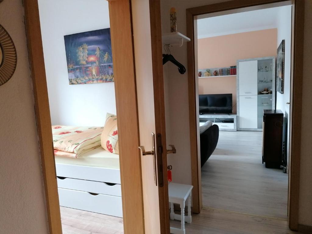 Postel nebo postele na pokoji v ubytování Ferienwohnung Rosenblick