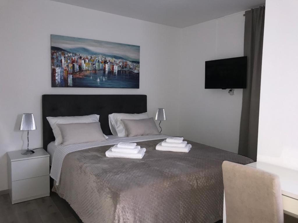 Postel nebo postele na pokoji v ubytování Rooms Marija
