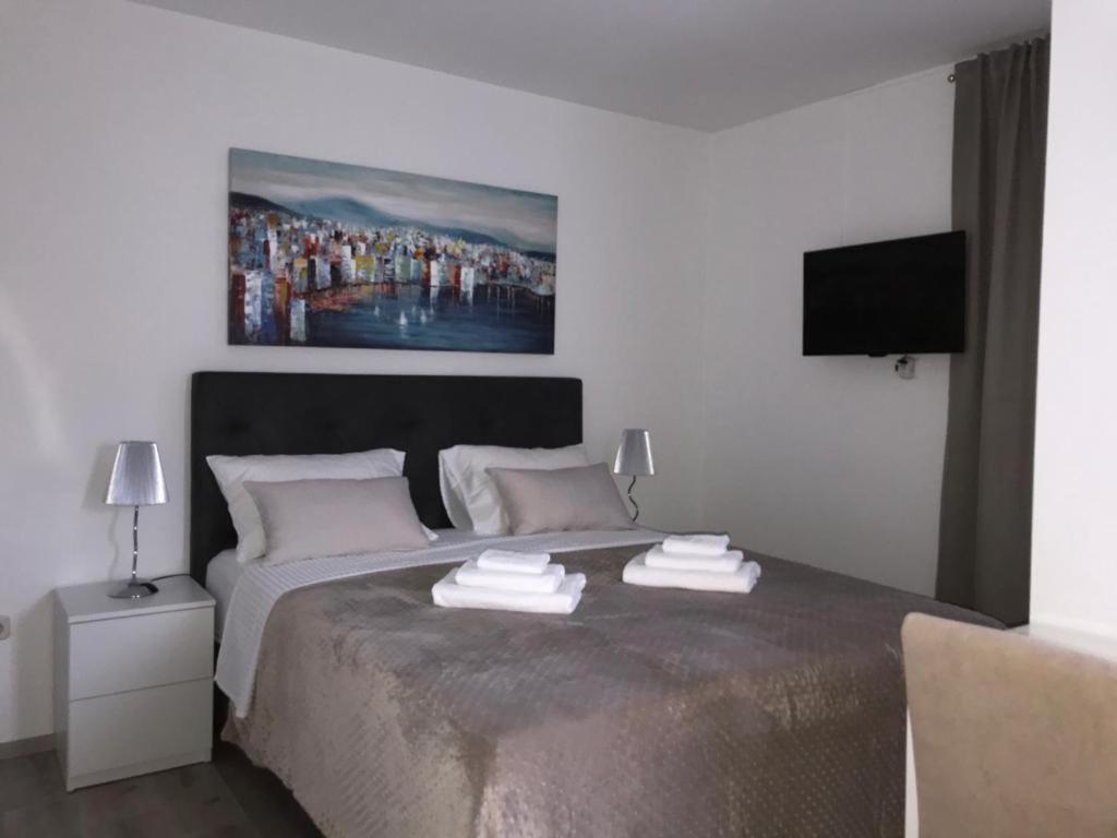 Postel nebo postele na pokoji v ubytování Rooms Marija