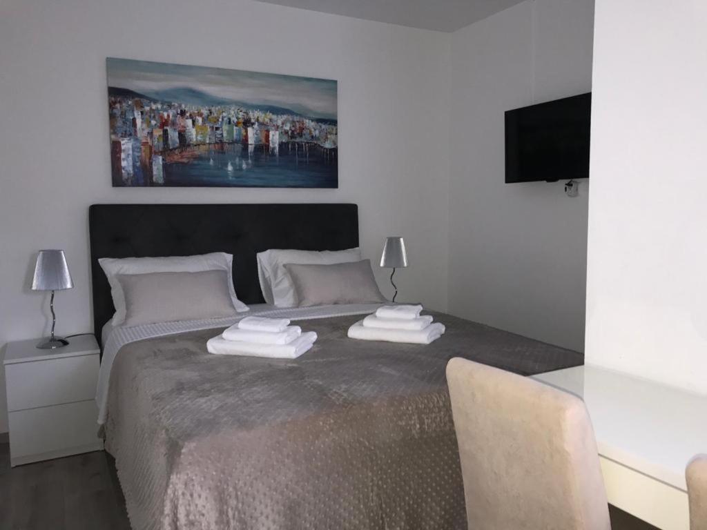 Postel nebo postele na pokoji v ubytování Rooms Marija