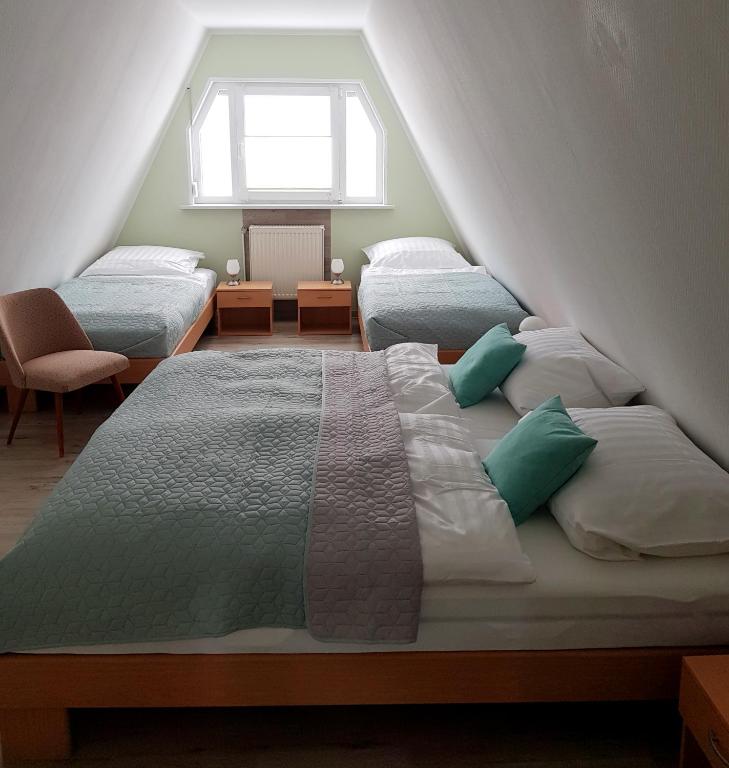 Postel nebo postele na pokoji v ubytování Harzer Finnhütte