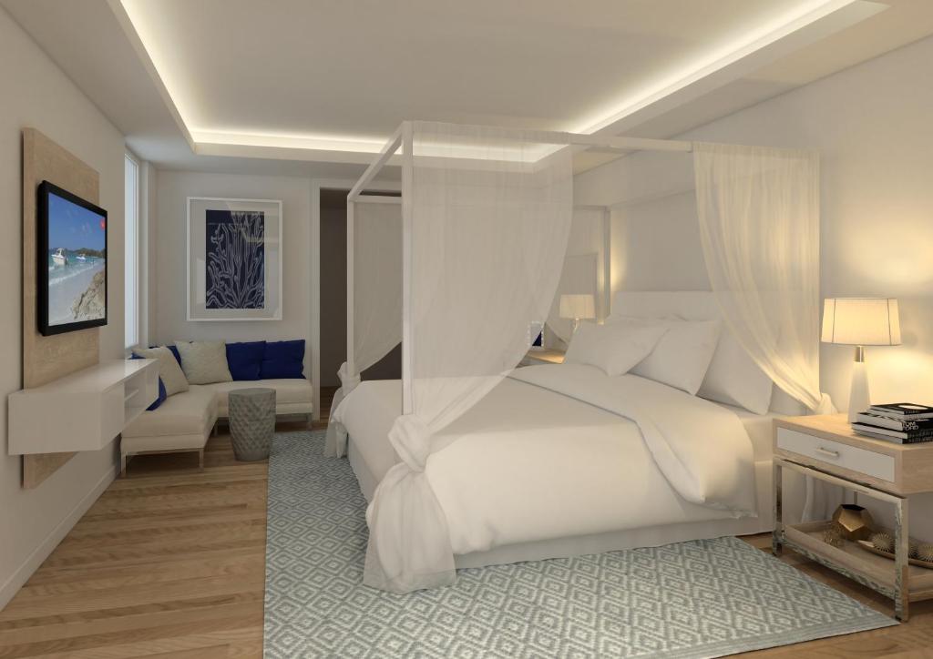 Posteľ alebo postele v izbe v ubytovaní Minos Imperial Luxury Beach Resort & Spa Milatos
