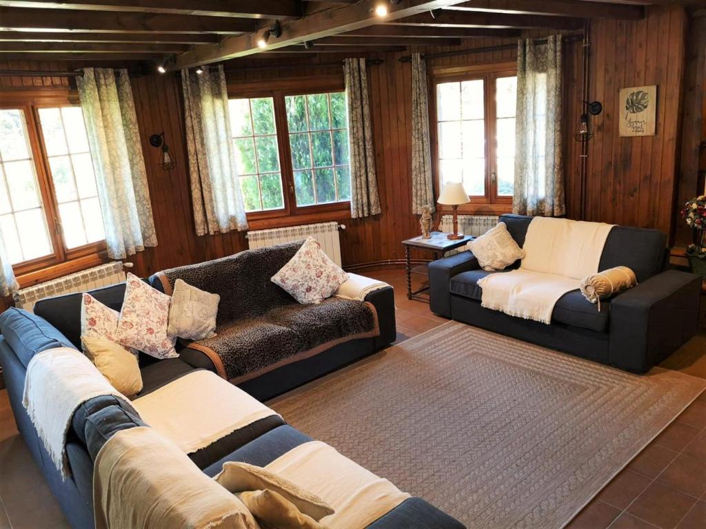 Posedenie v ubytovaní Chalet con gran jardín en Llivia