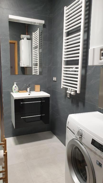 Kúpeľňa v ubytovaní LAGUNA Apartament 7 Willa Maria