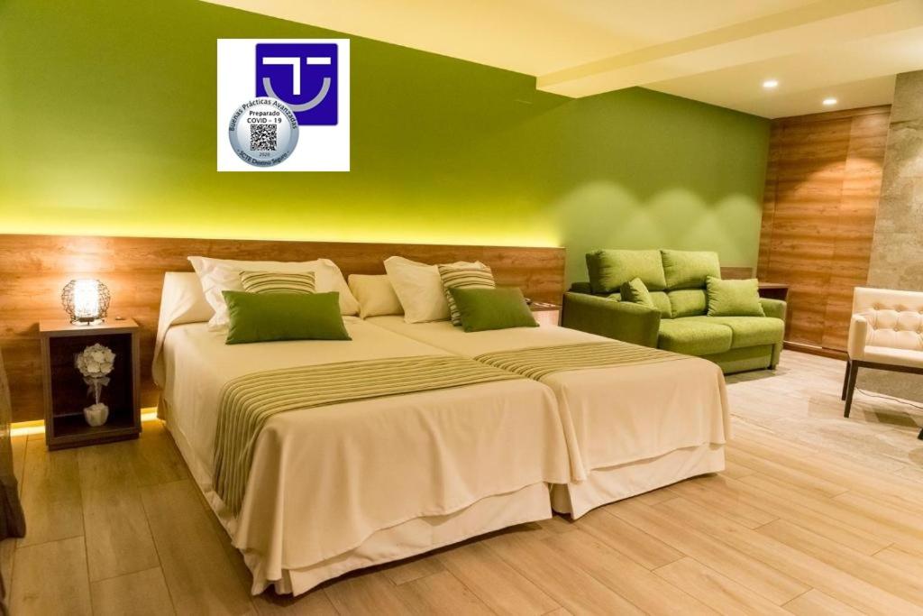 
A bed or beds in a room at Hotel Venta Baños
