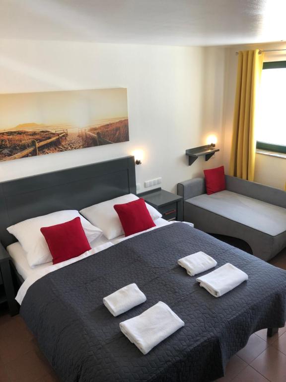 Posteľ alebo postele v izbe v ubytovaní Avila Park & SPA