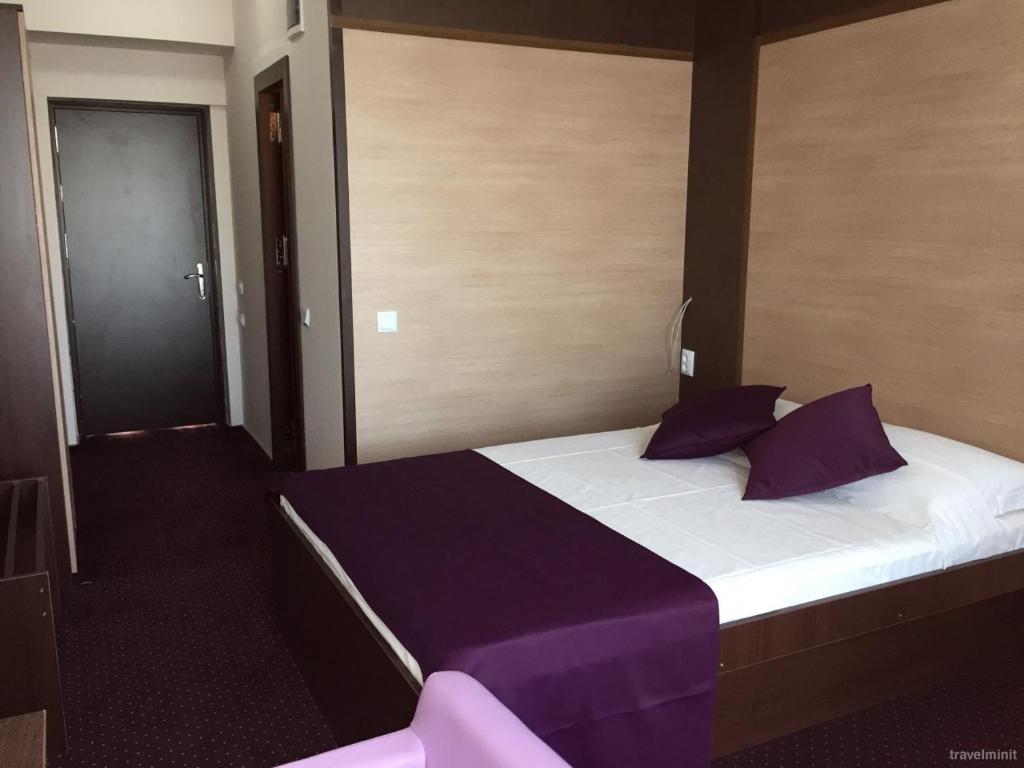 Postel nebo postele na pokoji v ubytování Delta Palace