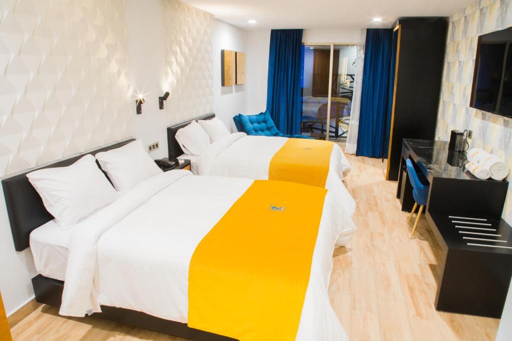 Postel nebo postele na pokoji v ubytování Ramë Hotel Boutique