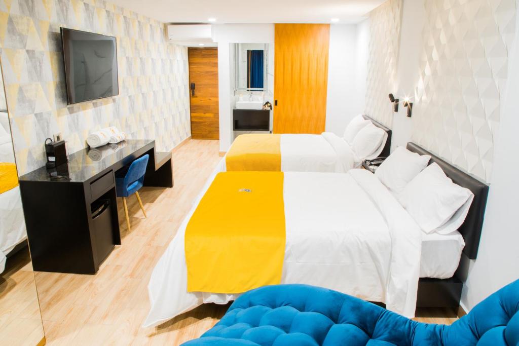 Postel nebo postele na pokoji v ubytování Ramë Hotel Boutique