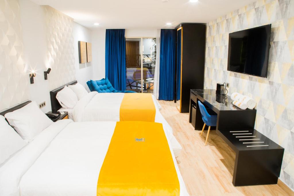 Postel nebo postele na pokoji v ubytování Ramë Hotel Boutique