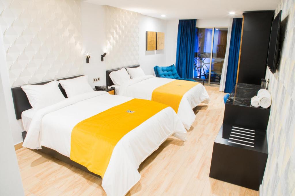 Postel nebo postele na pokoji v ubytování Ramë Hotel Boutique