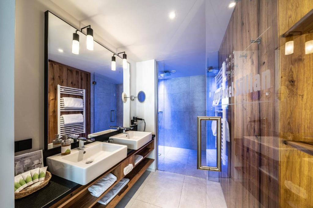 Kúpeľňa v ubytovaní Dolomiten Residenz - Sporthotel Sillian