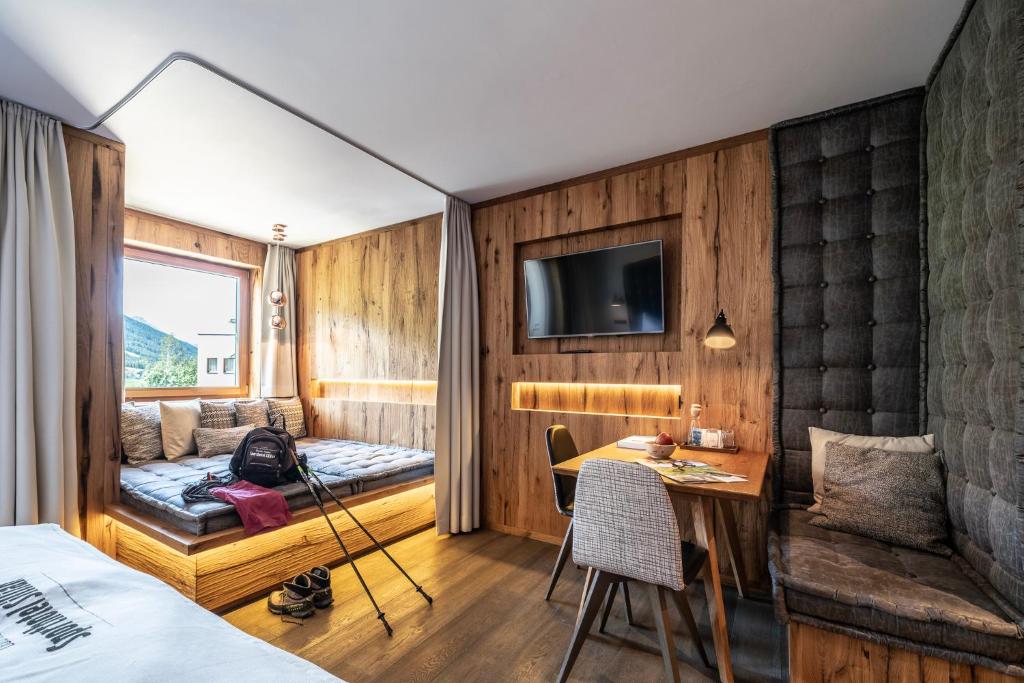 Posteľ alebo postele v izbe v ubytovaní Dolomiten Residenz - Sporthotel Sillian