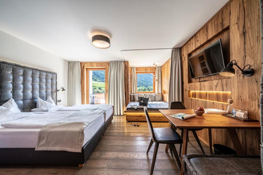 Posteľ alebo postele v izbe v ubytovaní Dolomiten Residenz - Sporthotel Sillian